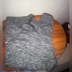 Grey sweatpants with a baggy fit